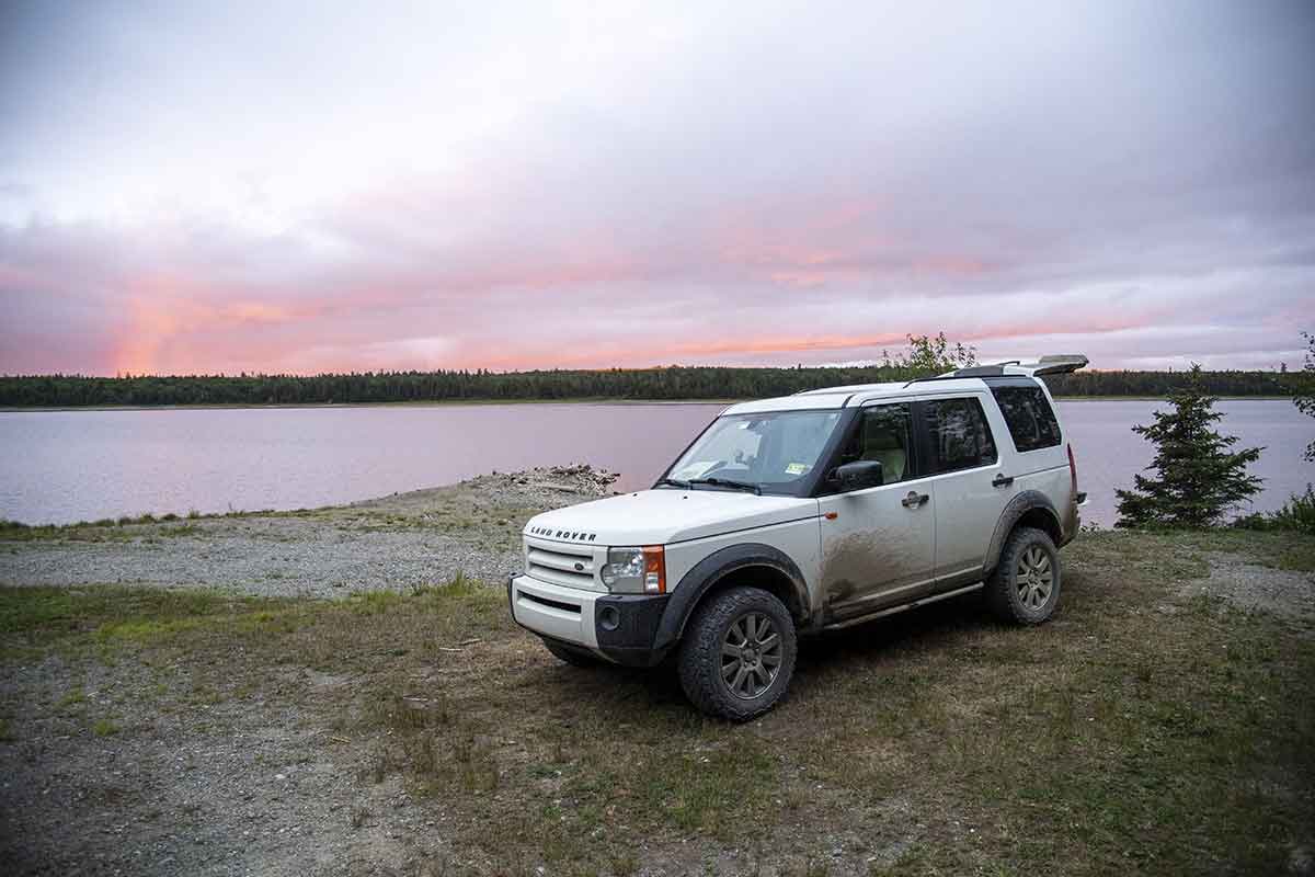 LR3 camping along lake in North Maine Woods